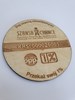 Picture of Podkładka okrągła, drewniana, grawerowana - logo Fundacji Szansa dla Niewidomych i jej KRS